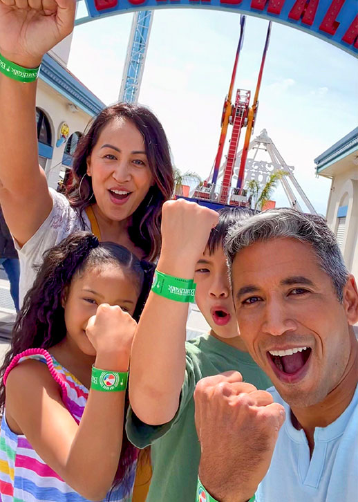 family showing wristbands
